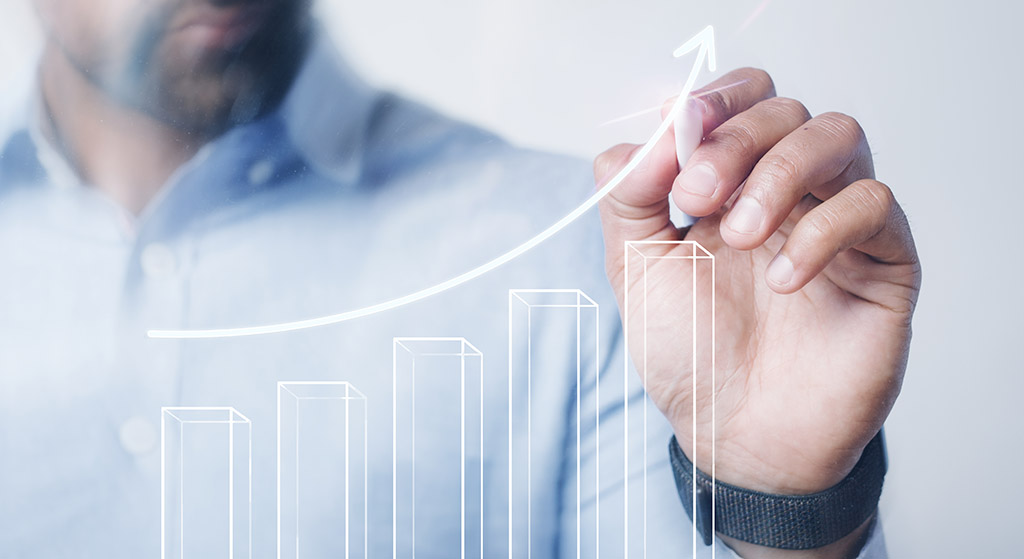Man giving a business presentation using a high technology digit
